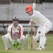 Farnworth wicket keeper Simon Booth is poised as Salesbury’s Garnett Tarr, who went on to make 98, prepares to play a shot Picture: Harry McGuire