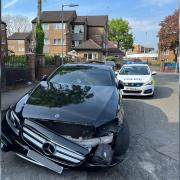 The smashed up Mercedes was seized after a chase spanning nearly three miles