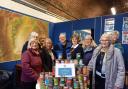 Horwich Inner Wheel donated 100 cans of food to Horwich Foodshare
