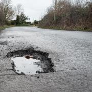 It is not advised to begin filling potholes yourself