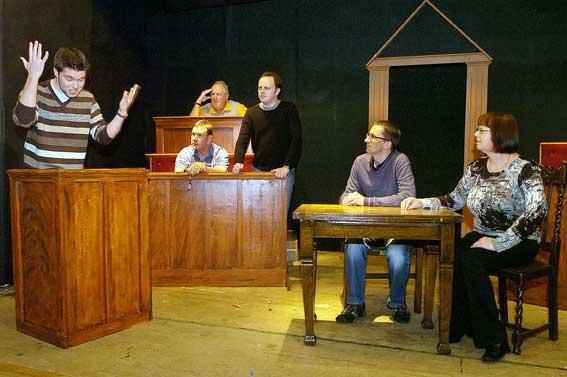 Members of the Marco Players rehearse for a performance of Agatha Christie's 
tense drama, Witness for the Prosecution. The production was in 2007, nearly 
20 years after the company held the Bolton debut of the play.