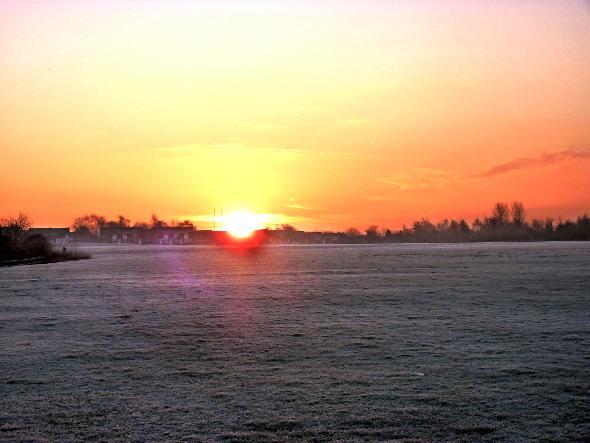 This dramatic scene is the sun rising on a frosty morning over New House farm playing fields, Breightmet, Bolton. 
It was submitted by Peter Hunter, of Breightmet.