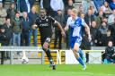 Cameron Jerome battles with Bristol Rovers' Connor Taylor Picture: CameraSport