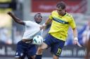 Brondby's former Wanderers striker Johan Elmander tussles with Medo