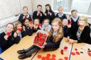 Pupils from the craft club at Waterfoot Primary School with teacher Madeline De Souza and front, Charlotte Stanworth, nine