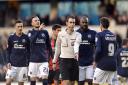Championship referee David Coote is surrounded by Millwall players after awarding a Bournemouth penalty recently. Coote, who takes charge of Wanderers on Saturday, could soon be professional