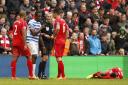 QPR's Nedum Onuoha is sent off by referee Martin Atkinson after a second caution at Anfield last Saturday