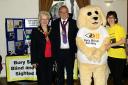Pictured at the event with the Society's mascot, Miss Charity Wolstenholme, are (from left): Mayor of Bury Cllr Stella Smith, her consort husband John and Jill Logan, Society chief executive officer