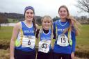 TOP TRIO: From left, Bolton Harriers Rachel Bailey, Lily Philbin and Molly Philbin at the Greater Manchester Cross Country Championships