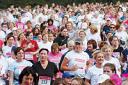 Racing for charity: Thousands of women took part in last Sunday's Race For Life in Leverhulme Park, Bolton