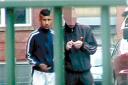 ILL-GOTTEN GAINS: Ahmad Bhana, left, shown in a police video selling drugs. He has been ordered to repay 110, 734