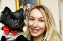 Shop owner Charlotte Ronald and pampered puppy Arnold