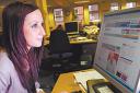 DIGITAL MEDIA: Reporter Sarah Poole looks at The Bolton News website, which is updated throughout the day
