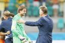 Netherlands keeper Tim Krul is congratulated by coach Louis Van Gaal after his penalty shootout heroics on Saturday