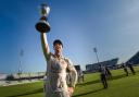 Lancashire's captain Dane Vilas poses with the trophy as they celebrates winning the Specsavers County Championship Division two match at Old Trafford, Manchester..