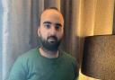 QUARANTINED: Hasim Sattar inside his room at the Radisson RED Hotel London Heathrow