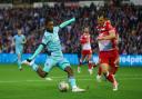 Paris Maghoma in action against Barnsley's Josh Earl on Friday night