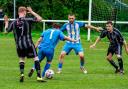 Alex Dodd (no 7) takes on Walshaw’s Jamie Hart as Nick Hepple looks on Picture: Grayce Barrick