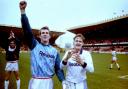 Keith Branagan and John McGinlay leave the field after an FA Cup win at Wolves in 1993