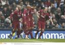 Wanderers players celebrate Nicolas Anelka's goal at Manchester City