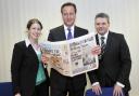 Prime Minister David Cameron with reporter Elaine O’Flynn and editor Ian Savage during his visit to The Bolton News