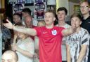Bolton fans dejected as Suarez sinks England