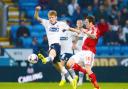 Joe Mason takes on Middlesbrough's Lee Tomlin on Tuesday night