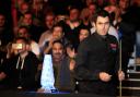 Ronnie O'Sullivan walks past the trophy as he walks out for the start of his match against Marco Fu during day five of the 2015 Dafabet Masters at Alexandra Palace, London. PRESS ASSOCIATION Photo. Picture date: Thursday January 15, 2015. See PA story