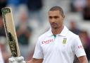 South African batsman Alviro Petersen celebrates scoring a century  against England