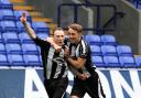 GOAL-DEN: Colls players celebrate another strike