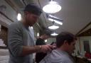 RAZOR SHARP: Luke Procter demonstrates his hairdressing skills at Ruger Barber