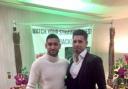 HOME: Amir Khan at The New Dhanak Deira, Blackburn Road, Bolton with owner Omar Shahid