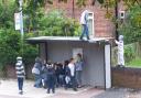 ANTI-SOCIAL: A Police Community Support Officer took this picture of yobs at a bus stop in New Lane, Breightmet