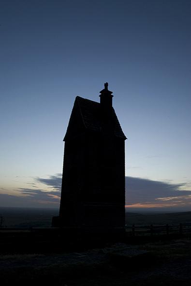This picture, submitted by Chris Banks, of Breightmet, is of the silhouetted Pigeon Tower at Rivington at dusk.
