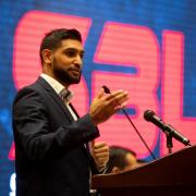 Amir Khan speaking at a press conference ahead of the fight