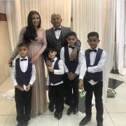 Tariq with his loving wife and four sons. From left; Zakariya, wife Sanchia, Samuel, Reece and Isaac