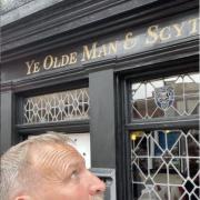 Christopher Eccleston outside Ye Olde Man and Scythe in Churchgate, Bolton town centre (Image: christophereccleston Instagram)