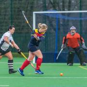 WINNING CONTRIBUTION: Jenny Brookfield, centre, in action against Bowdon. Her short corner led to the winning goal from Lu Bull