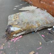 Mattress fly-tipped at the back of Deane Church Lane