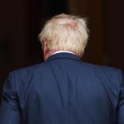 Boris Johnson returns inside after addressing the nation as he announces his resignation outside 10 Downing Street