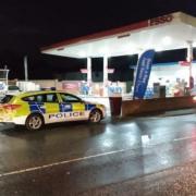 Police at the Esso garage in Little Lever on Sunday night