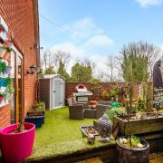 The garden is a haven of greenery and, right, a games room and one of the bathrooms