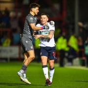 James Trafford and Aaron Morley celebrate in the Papa Johns Trophy semi-final against Accrington