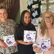 From left; Nicola Collinson, Lucy Edwards and Julie Robinson with copies of the book