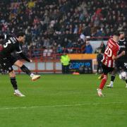 Jack Iredale nearly wins it for Wanderers with a late shot at Exeter