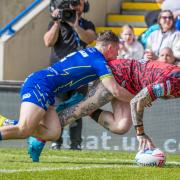Josh Charnley touches down