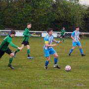 Daisy captain Jake O’Brien under pressure from the Tempest United defence