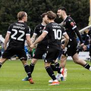 Kyle Dempsey celebrates his goal against Peterborough United