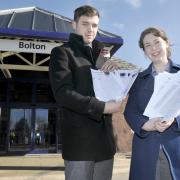 Bolton News political reporter Elaine O’Flynn, and colleague Liam Thorp, with the petition that is going to No 10