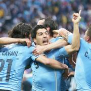 Luis Suarez celebrates the goal which put England on the brink of World Cup elimination